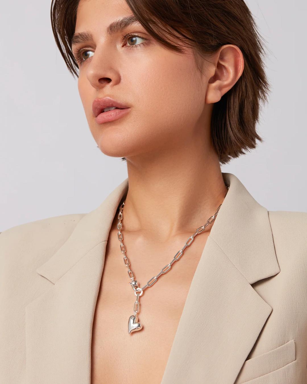 jenny bird link necklace with heart pendant in silver