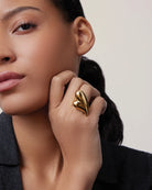 statement gold ring in the shape of a heart
