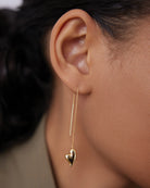gold threader earrings with heart on bottom
