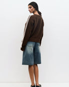 brown knit ip up sweater with white stripe down arms