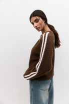 brown knit ip up sweater with white stripe down arms