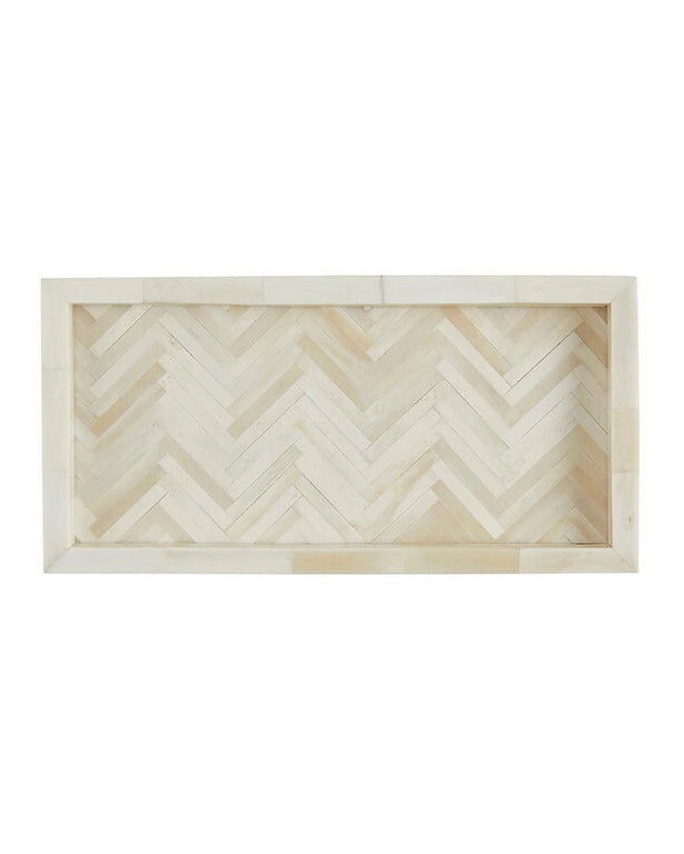 a herringbone patterned rectangular decorative tray