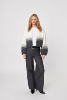 open cardigan with white top.that fades into black