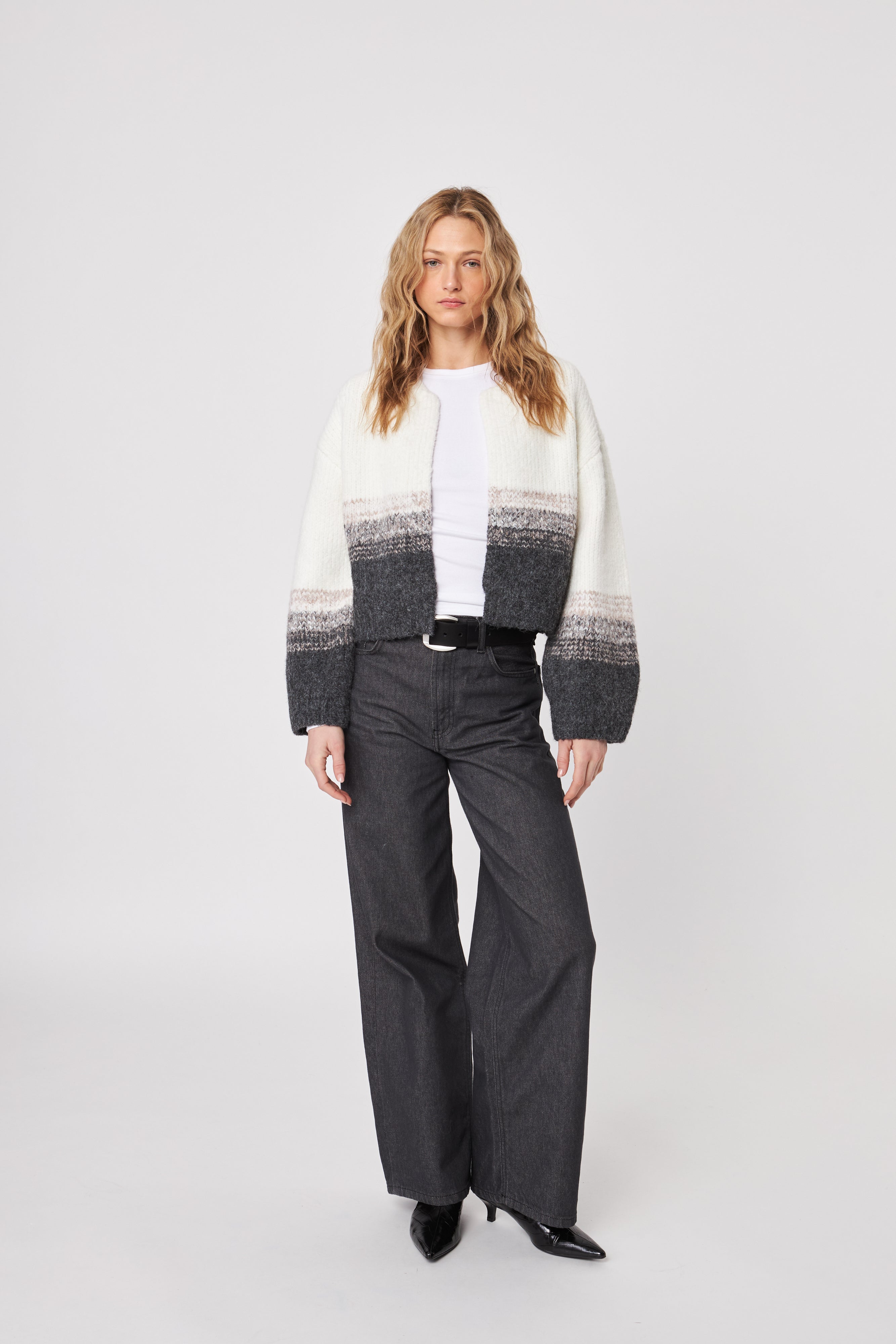 open cardigan with white top.that fades into black