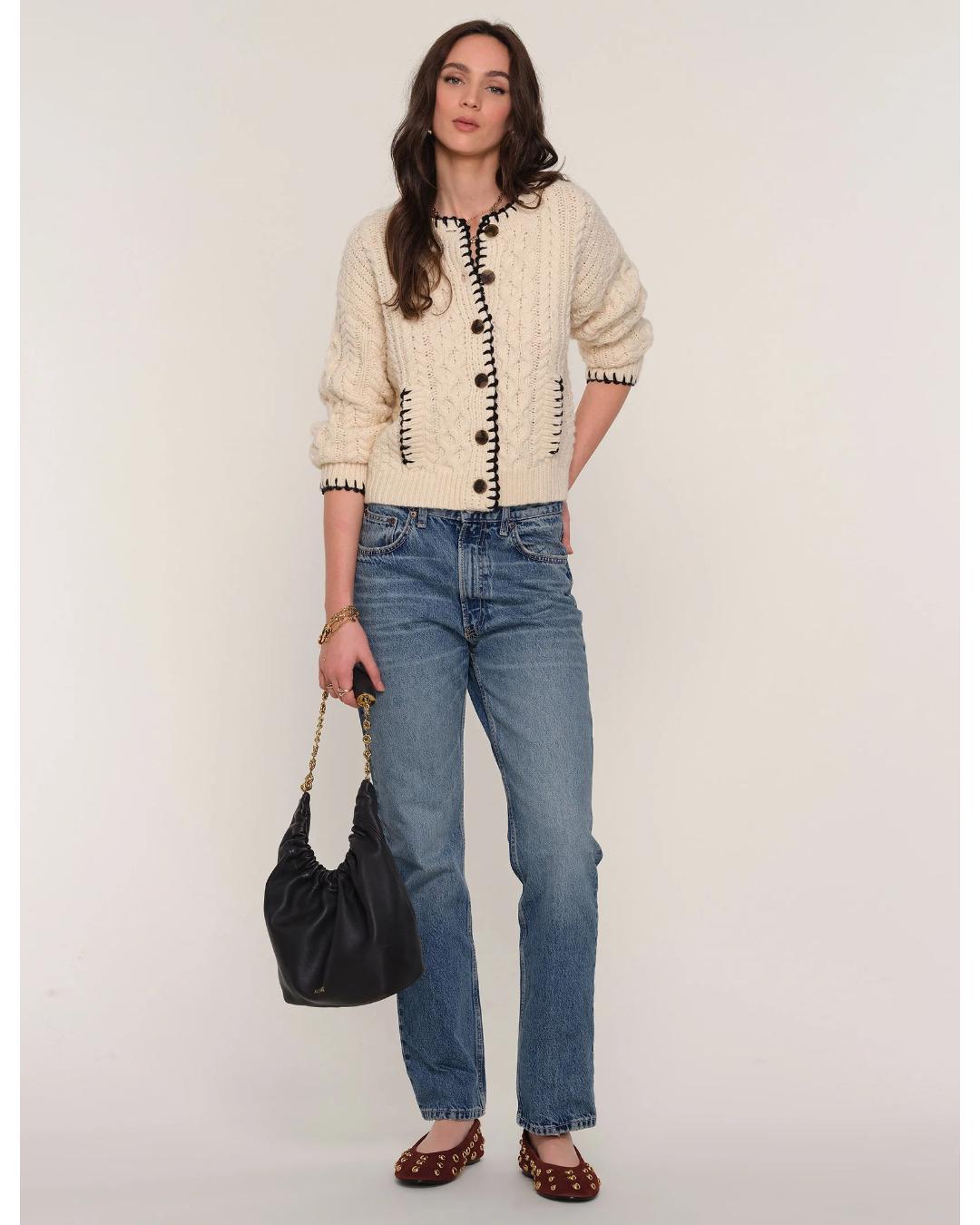 cream cardigan with black stitching outline