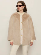 beige coloured fur coat