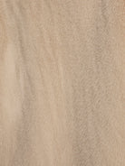 beige coloured fur coat