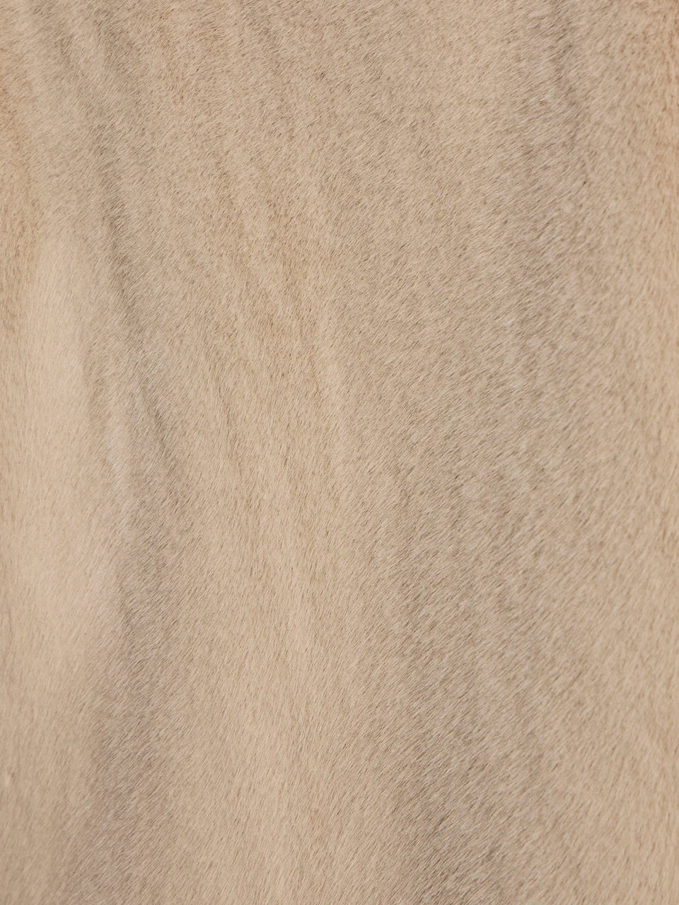 beige coloured fur coat
