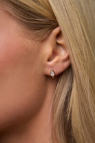 pear shaped gold huggie earring