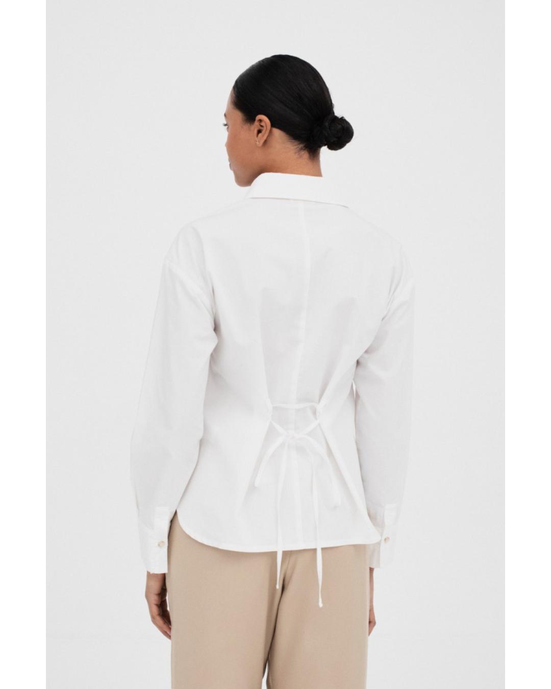 button up white blouse with a tie in the back