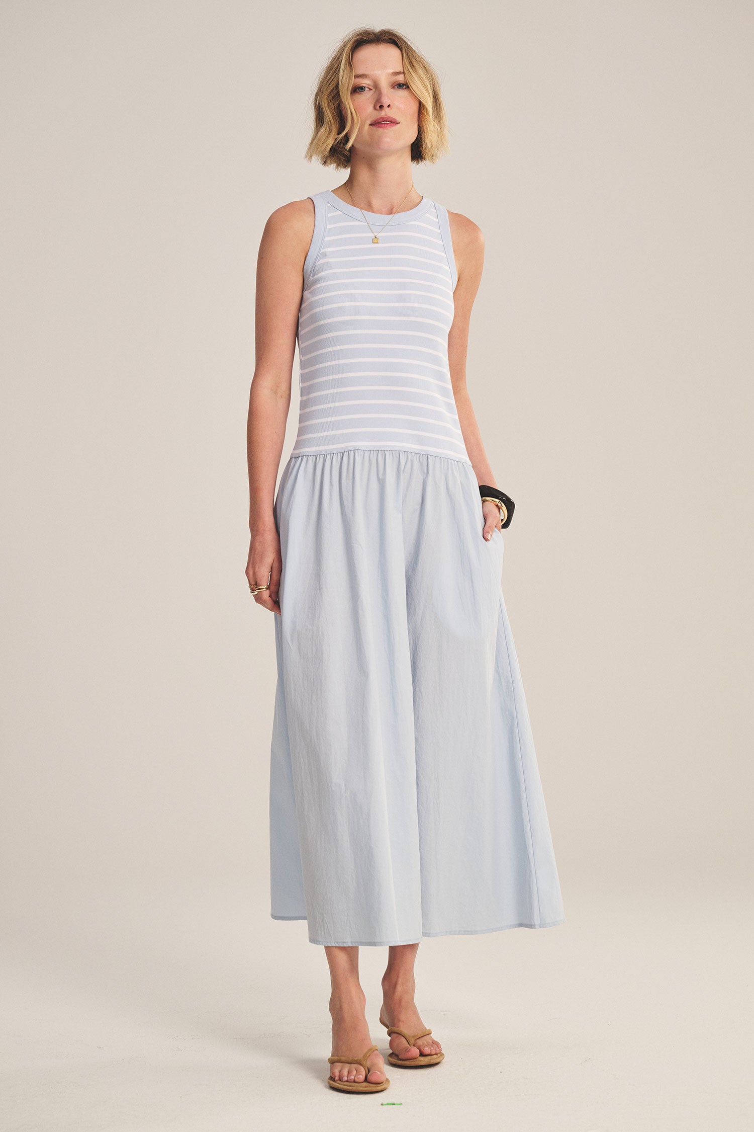 blue midi dress with a striped top and flowy bottom