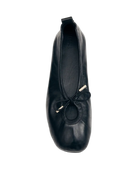 black leather ballet flats with a cut out and bow