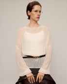 white knit sweater