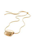 necklace with a statement gold pendant on a long thick gold chain