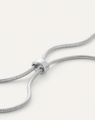 necklace with a statement solver pendant on a long thick silver chain
