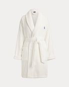 a short cotton terry bathrobe with the polo ralph lauren logo on the chest and a large bear embroidered on the back