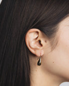 bean shaped gold drop earring