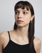 bean shaped gold drop earring