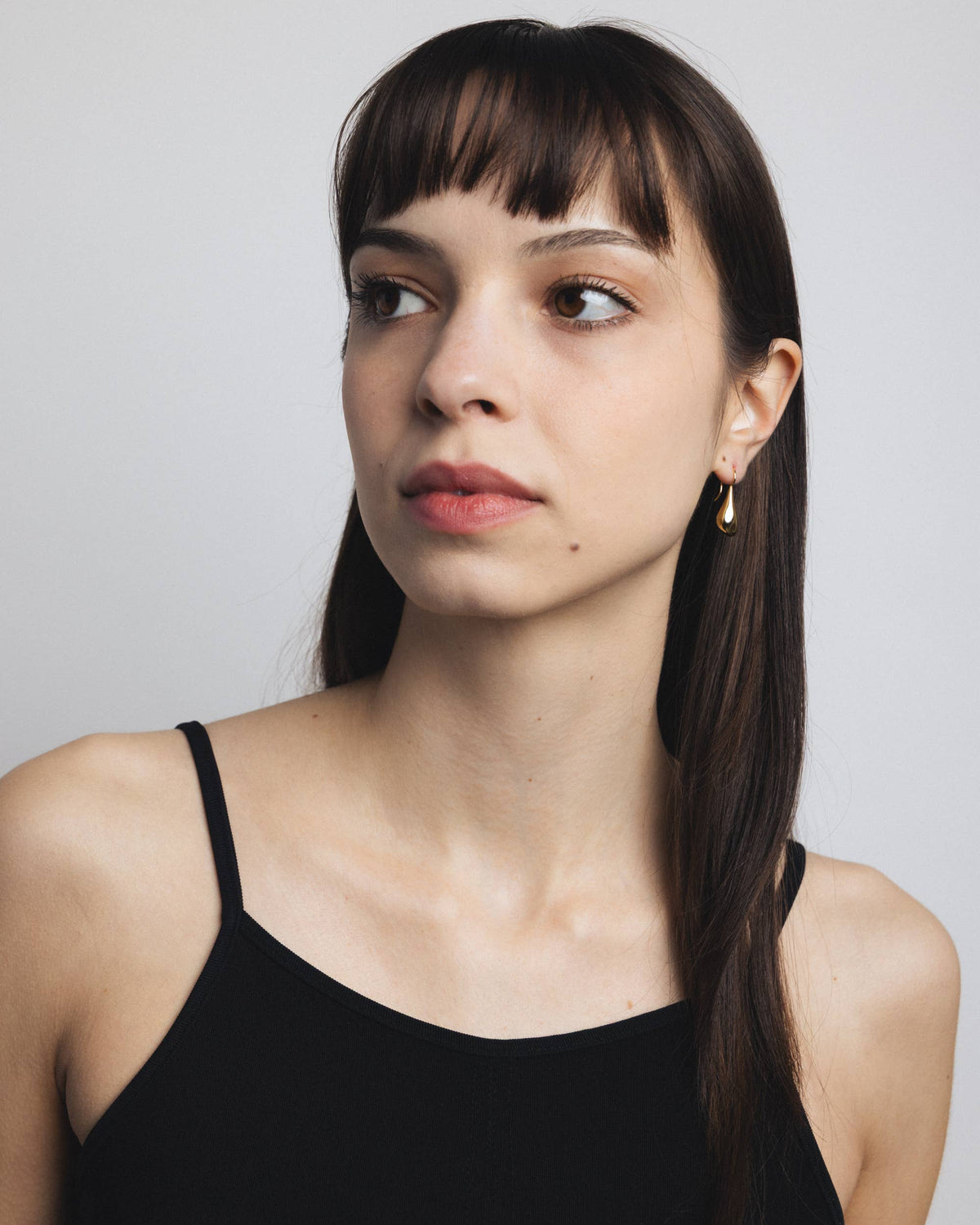 bean shaped gold drop earring