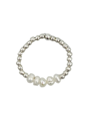 silver ring with pearls in the middle