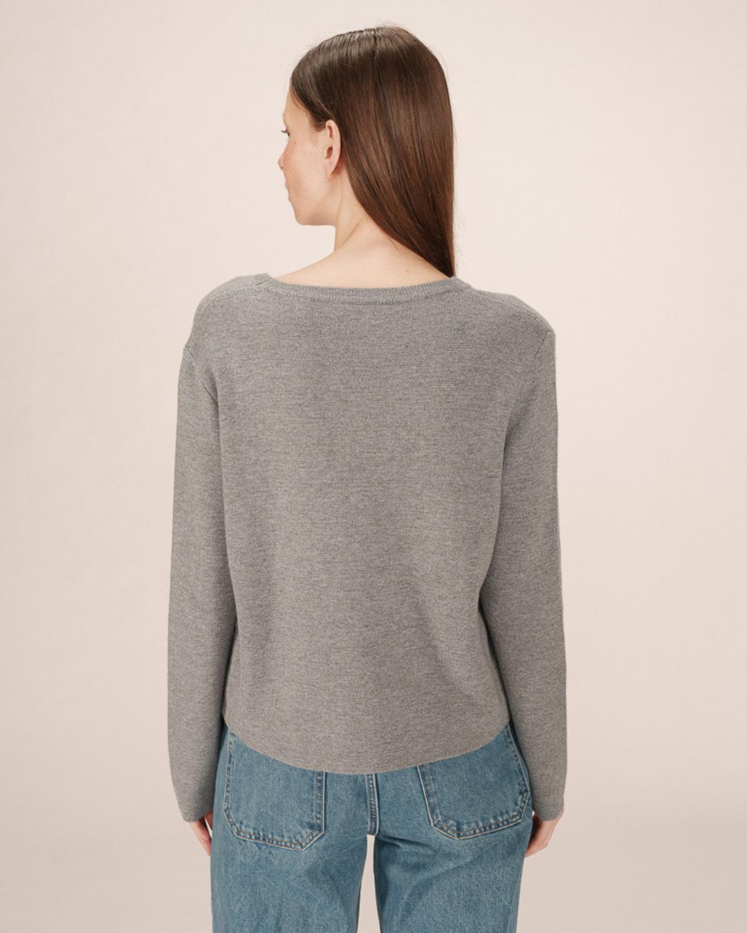 grey crewneck with grace paris written on the chest