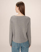 grey crewneck with grace paris written on the chest