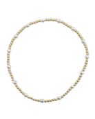 gold beaded bracelet with silver bead in between throughout