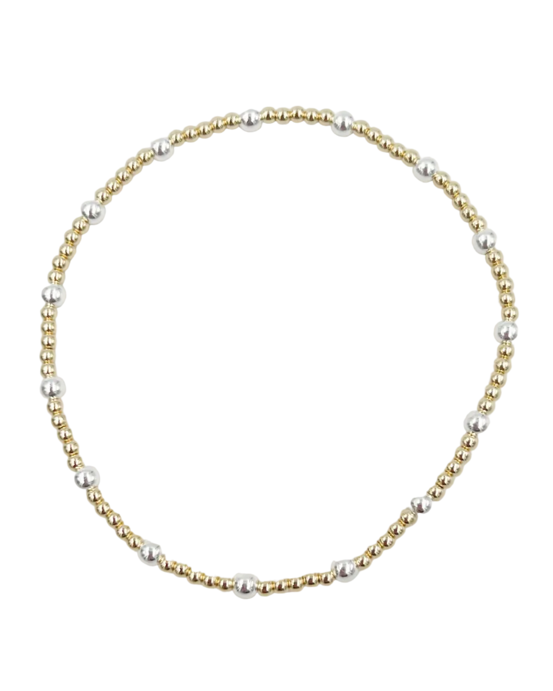 gold beaded bracelet with silver bead in between throughout