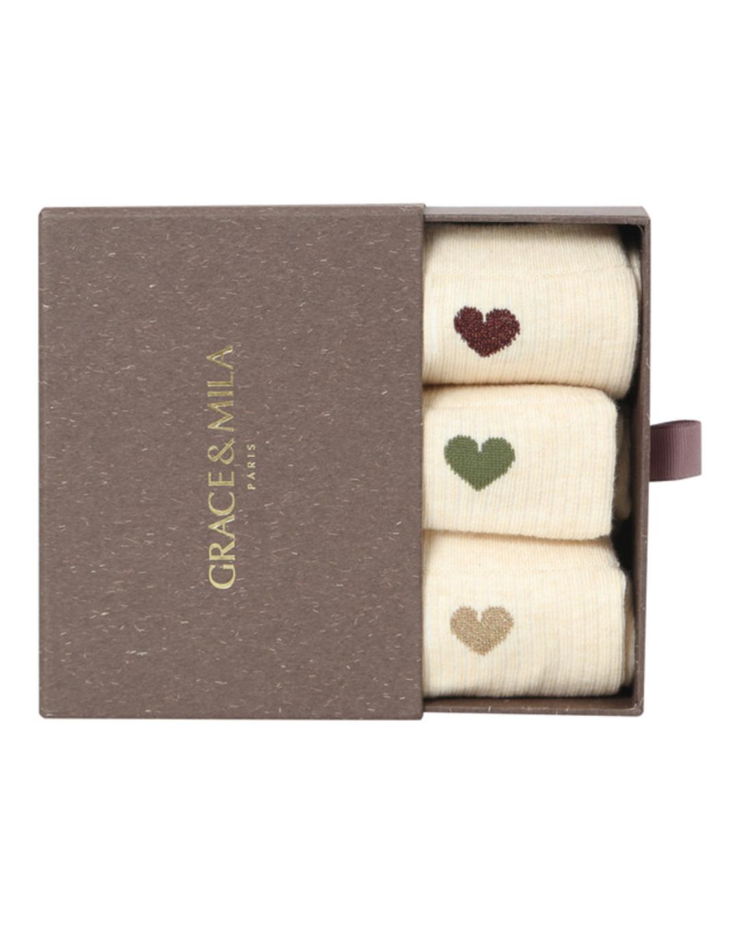 cream socks with a printed heart on the side