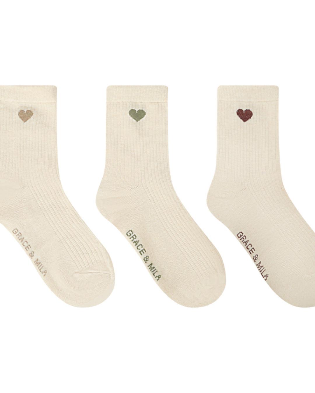 cream socks with a printed heart on the side