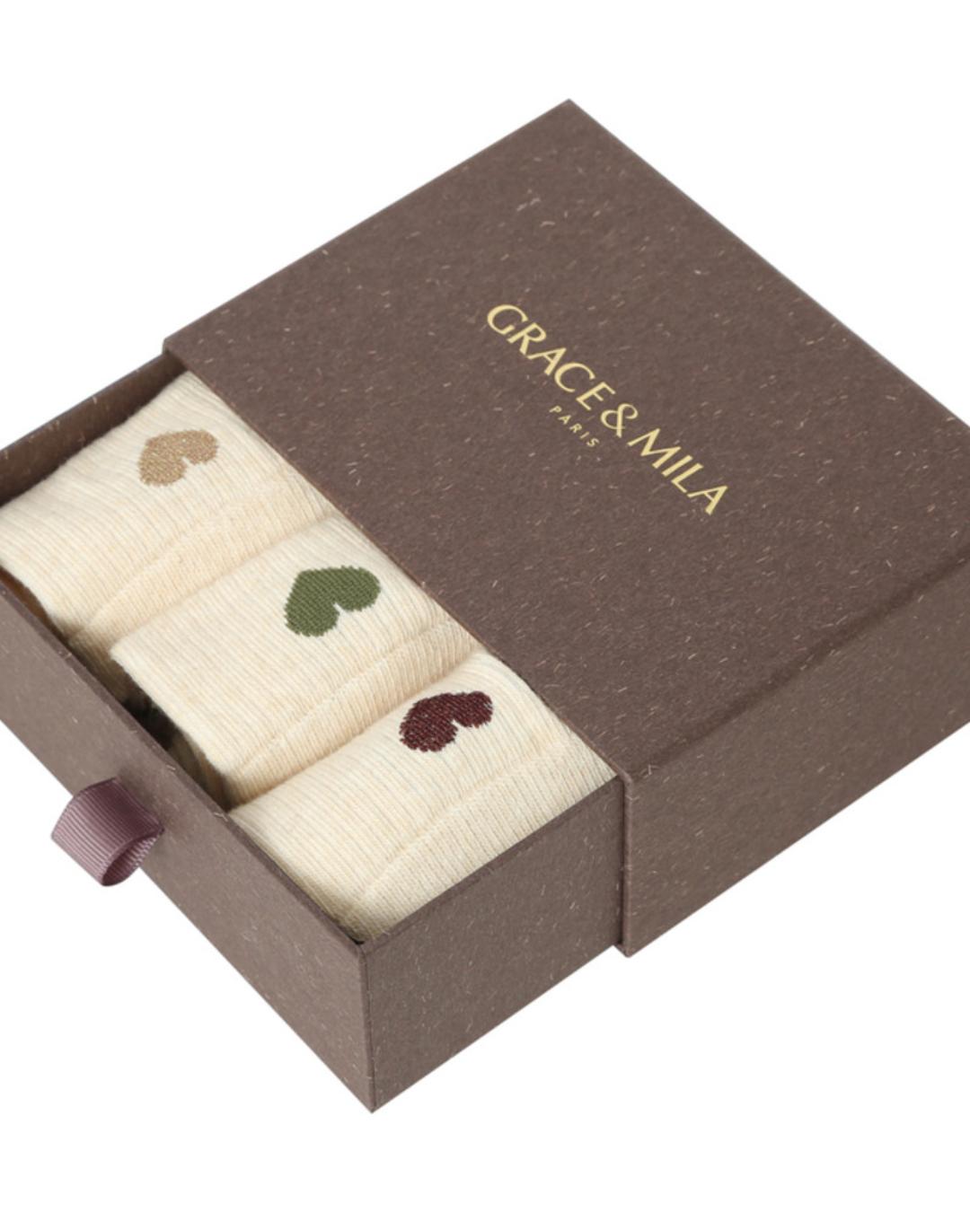 cream socks with a printed heart on the side