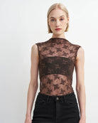 brown sleeveless sheer top with details all over