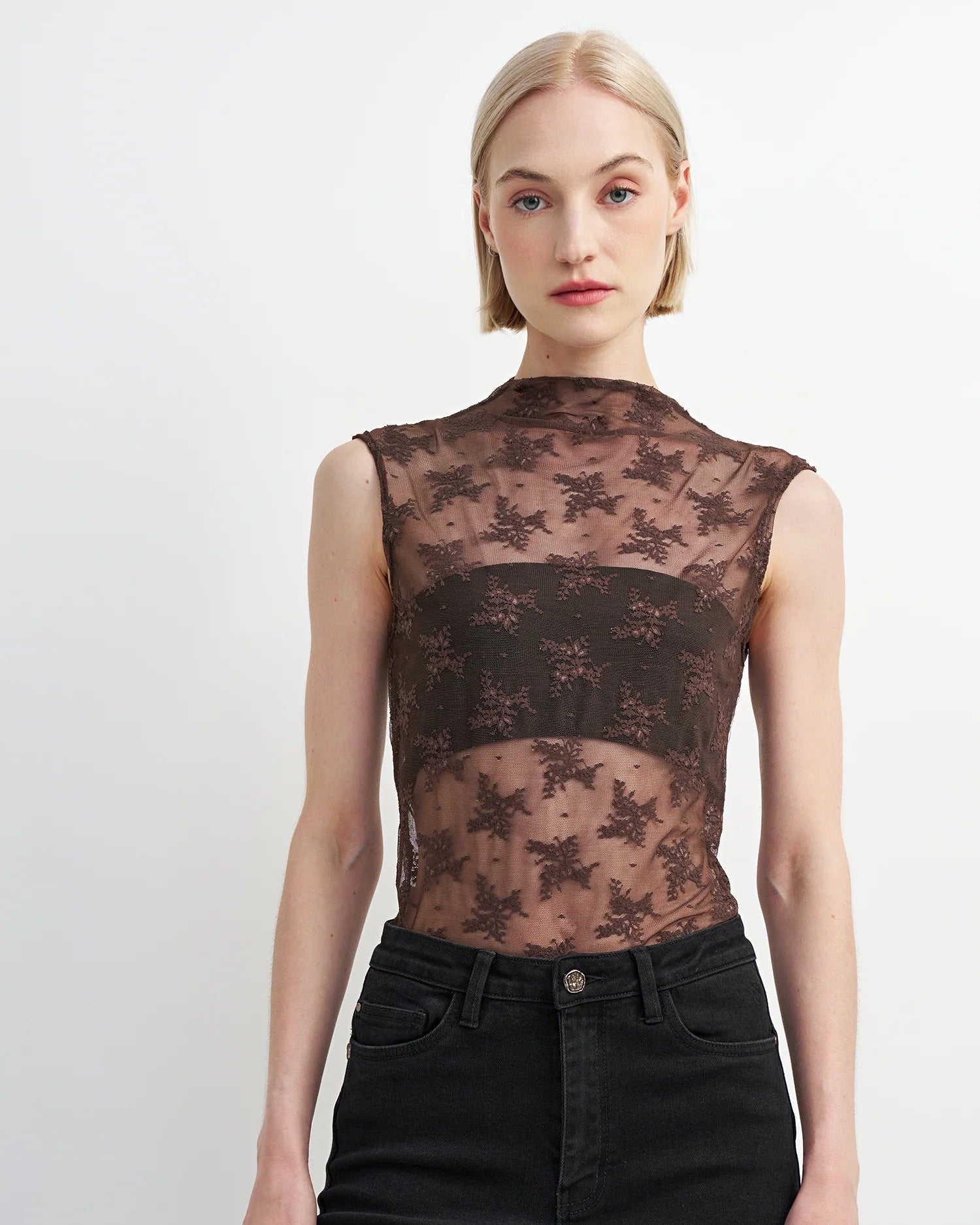 brown sleeveless sheer top with details all over