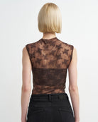 brown sleeveless sheer top with details all over