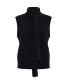 Woman wearing a black sleeveless sweater with scarf detail