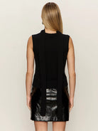 black turtleneck sleeveless shirt with a built in scarf