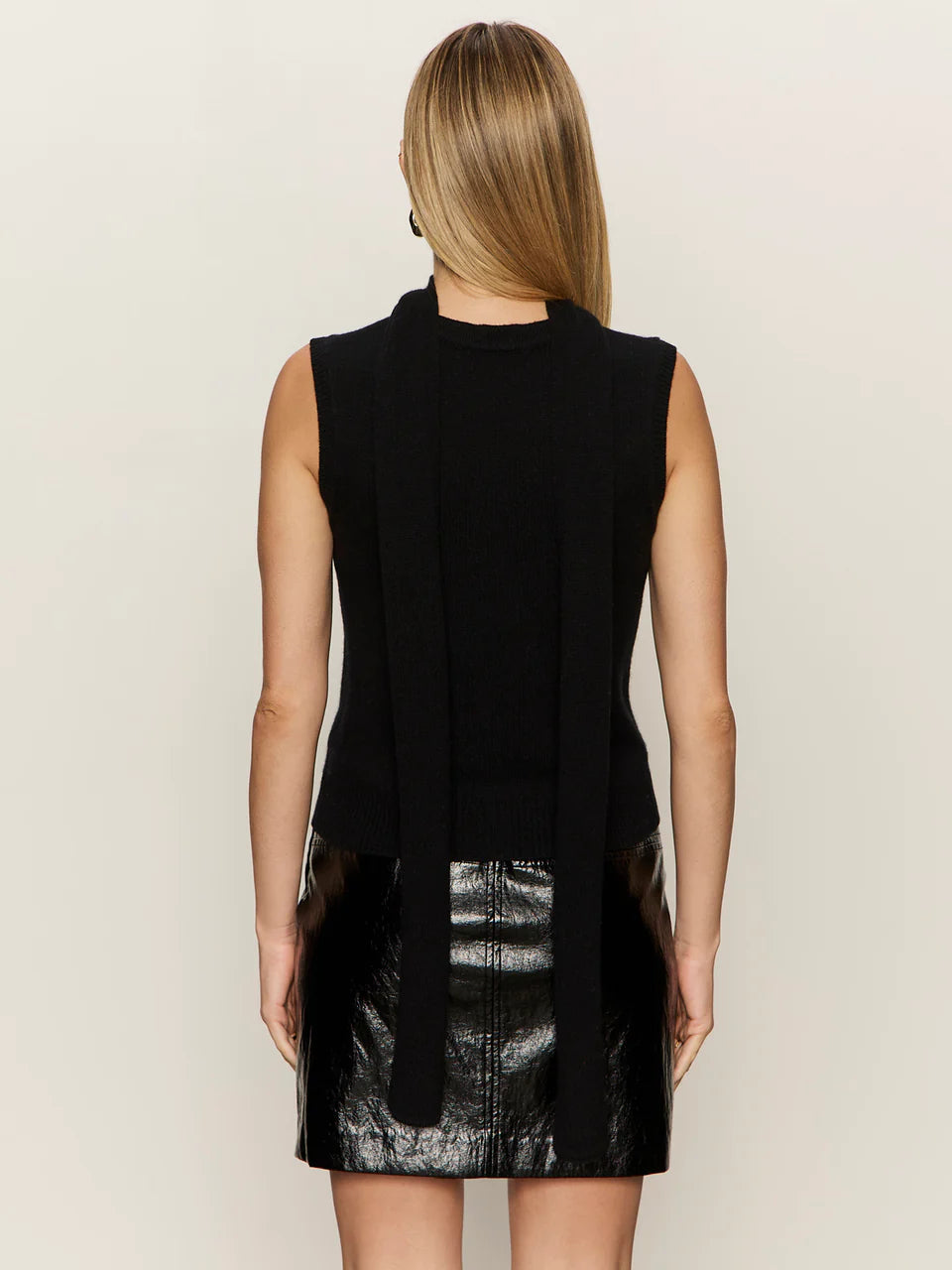 black turtleneck sleeveless shirt with a built in scarf