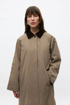 long light brown coat with darks brown collar