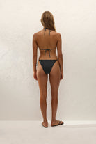 black bikini bottom with cream polka dots