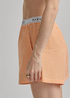 orange and white stripe boxer short with an elastic waist
