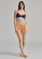 orange and white stripe boxer short with an elastic waist