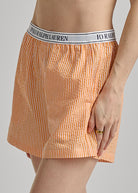orange and white stripe boxer short with an elastic waist