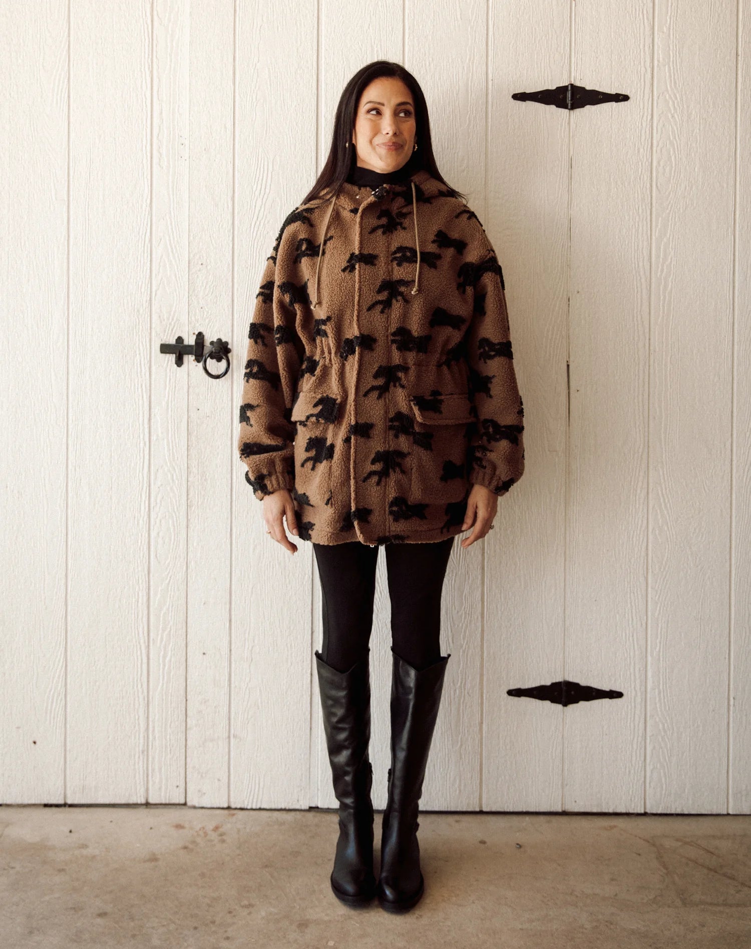 brown parka jacket with brow horses 