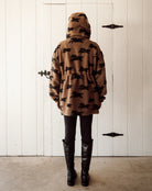brown parka jacket with brow horses 