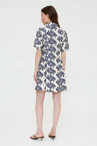 short sleeve dress in cream with blue palm trees