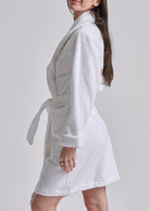 short white robe with polo bear on the back