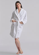 short white robe with polo bear on the back