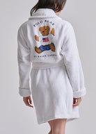 short white robe with polo bear on the back