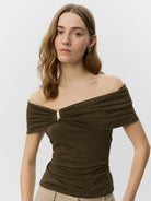 strapless off shoulder drop in brown with gold detail
