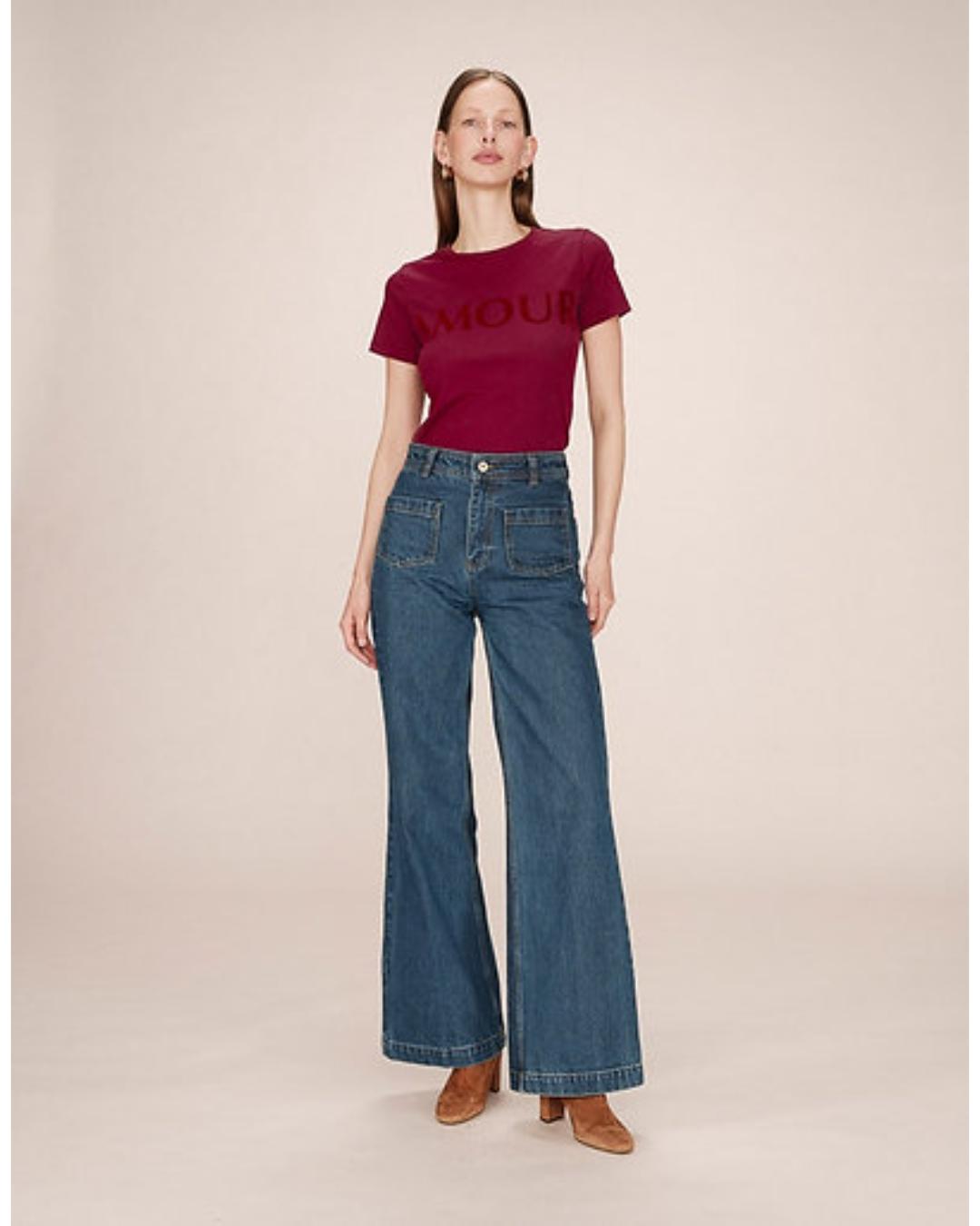red t-shirt with amour written across the chest
